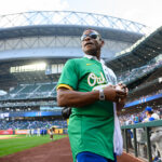Sep 29, 2024; Seattle, Washington, USA; MLB Hall of Famer Rickey Henderson after throwing out the ceremonial first pitch before the game between the Seattle Mariners and the Oakland Athletics at T-Mobile Park.