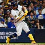 Oct 3, 2024; Milwaukee, Wisconsin, USA; Milwaukee Brewers catcher Gary Sanchez (99) hits a double in the second inning against the New York Mets during game three of the Wildcard round for the 2024 MLB Playoffs at American Family Field. Mandatory Credit: Benny Sieu-Imagn Images