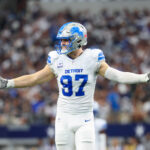 Oct 13, 2024; Arlington, Texas, USA; Detroit Lions defensive end Aidan Hutchinson (97) in action during the game against the Dallas Cowboys at AT&T Stadium. Mandatory Credit: Kevin Jairaj-Imagn Images