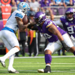 Oct 20, 2024; Minneapolis, Minnesota, USA; NFL; Minnesota Vikings defensive end Jonathan Bullard (90) tackles Detroit Lions wide receiver Tim Patrick (17) during the first quarter at U.S. Bank Stadium.
