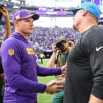 Oct 20, 2024; Minneapolis, Minnesota, USA; Minnesota Vikings head coach Kevin O'Connell and Detroit Lions head coach Dan Campbell shakes hands after the game at U.S. Bank Stadium.