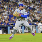 Oct 20, 2024; Los Angeles, California, USA; New York Mets first baseman Pete Alonso (20) fields the ball hit by Los Angeles Dodgers second baseman Chris Taylor (not pictured) in the sixth inning during game six of the NLCS for the 2024 MLB playoffs at Dodger Stadium. Mandatory Credit: Jayne Kamin-Oncea-Imagn Images