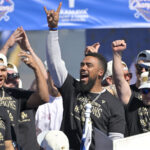 Nov 1, 2024; Los Angeles, CA, USA; Los Angeles Dodgers left fielder Teoscar Hernandez (37) cheers during the World Series Championship Celebration at Dodger Stadium.