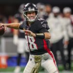 Nov 3, 2024; Atlanta, Georgia, USA; Atlanta Falcons quarterback Kirk Cousins (18) throws a pass against the Dallas Cowboys in the fourth quarter at Mercedes-Benz Stadium.