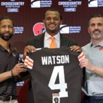 Cleveland Browns quarterback Deshaun Watson, center, poses for a portrait with general manager Andrew Berry, left, and coach Kevin Stefanski during Watson's introductory news conference on March 26, 2022, at the Browns training facility in Berea.