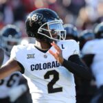 Nov 9, 2024; Lubbock, Texas, USA; Colorado Buffalos quarterback Shedeur Sanders (2) passes against the Texas Tech Red Raiders in the first half at Jones AT&T Stadium and Cody Campbell Field. Mandatory Credit: Michael C. Johnson-Imagn Images