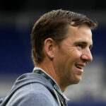 Nov 10, 2024; Harrison, New Jersey, USA; NJ/NY Gotham FC minority owner Eli Manning looks on before a 2024 NWSL Playoffs quarterfinal match against Portland Thorns FC at Red Bull Arena. Mandatory Credit: Lucas Boland-Imagn Images