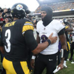 Nov 17, 2024; Pittsburgh, Pennsylvania, USA; NFL; Pittsburgh Steelers quarterback Russell Wilson (3) and Baltimore Ravens quarterback Lamar Jackson (8) meet at mid-field after playing at Acrisure Stadium.