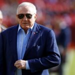 Nov 24, 2024; Landover, Maryland, USA; Dallas Cowboys owner Jerry Jones walks off the field before the game between the Washington Commanders and the Dallas Cowboys at Northwest Stadium. Mandatory Credit: Peter Casey-Imagn Images