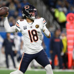 Nov 28, 2024; Detroit, Michigan, USA; Chicago Bears quarterback Caleb Williams (18) throws a pass against the Detroit Lions in the second quarter at Ford Field. Mandatory Credit: Lon Horwedel-Imagn Images