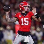 Nov 29, 2024; Athens, Georgia, USA; Georgia Bulldogs quarterback Carson Beck (15) throws a pass against the Georgia Tech Yellow Jackets in the first quarter at Sanford Stadium. Mandatory Credit: Brett Davis-Imagn Images