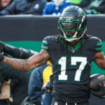 Dec 1, 2024; East Rutherford, New Jersey, USA; New York Jets wide receiver Davante Adams (17) celebrates his touchdown reception during the first quarter against the Seattle Seahawks at MetLife Stadium. Mandatory Credit: Vincent Carchietta-Imagn Images