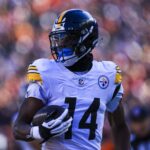 Dec 1, 2024; Cincinnati, Ohio, USA; Pittsburgh Steelers wide receiver George Pickens (14) runs the ball in for a touchdown against the Cincinnati Bengals in the first half at Paycor Stadium. Mandatory Credit: Katie Stratman-Imagn Images