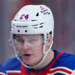 Nov 27, 2024; Raleigh, North Carolina, USA; New York Rangers right wing Kaapo Kakko (24) looks on against the Carolina Hurricanes during the first period at Lenovo Center.