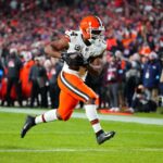 Dec 2, 2024; Denver, Colorado, USA; Cleveland Browns running back Nick Chubb (24) scores a touchdown in the fourth quarter against the Denver Broncos at Empower Field at Mile High. Mandatory Credit: Ron Chenoy-Imagn Images