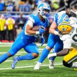 Detroit Lions running back David Montgomery (5) runs for a touchdown against Green Bay Packers during the first half at Ford Field in Detroit on Thursday, Dec. 5, 2024.