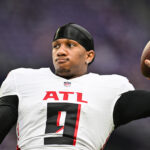 Dec 8, 2024; Minneapolis, Minnesota, USA; Atlanta Falcons quarterback Michael Penix Jr. (9) warms up before the game against the Minnesota Vikings at U.S. Bank Stadium.