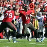 Dec 8, 2024; Tampa, Florida, USA; Tampa Bay Buccaneers quarterback Baker Mayfield (6) throws the ball against the Las Vegas Raiders during the second quarter at Raymond James Stadium. Mandatory Credit: Kim Klement Neitzel-Imagn Images