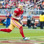 Dec 8, 2024; Santa Clara, California, USA; San Francisco 49ers running back Isaac Guerendo (31) runs in a touchdown during the fourth quarter against the Chicago Bears at Levi's Stadium. Mandatory Credit: Bob Kupbens-Imagn Images