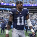 Dec 15, 2024; Charlotte, North Carolina, USA; Dallas Cowboys linebacker Micah Parsons (11) walks onto the field during the first quarter against the Carolina Panthers at Bank of America Stadium.