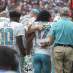 Dec 15, 2024; Houston, Texas, USA; Miami Dolphins wide receiver Jaylen Waddle (17) is helped off the field during the second quarter against the Houston Texans at NRG Stadium. Mandatory Credit: Troy Taormina-Imagn Images