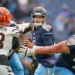Tennessee Titans quarterback Mason Rudolph (11) looks downfield during the fourth quarter against the Cincinnati Bengals at Nissan Stadium in Nashville, Tenn., Sunday, Dec. 15, 2024.