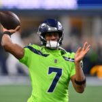 Dec 15, 2024; Seattle, Washington, USA; Seattle Seahawks quarterback Geno Smith (7) throws the ball during warmups before the game against the Green Bay Packers at Lumen Field.