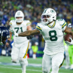 NFL: Green Bay Packers at Seattle Seahawks. Dec 15, 2024; Seattle, Washington, USA; Green Bay Packers running back Josh Jacobs (8) rushes against the Seattle Seahawks during the first quarter at Lumen Field. Mandatory Credit: Joe Nicholson-Imagn Images