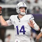Dec 16, 2024; Minneapolis, Minnesota, USA; Minnesota Vikings quarterback Sam Darnold (14) throws a pass against the Chicago Bears during the third quarter at U.S. Bank Stadium.