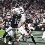 Dec 16, 2024; Paradise, Nevada, USA; Atlanta Falcons safety Jessie Bates III (3) intercepts a pass intended for Las Vegas Raiders wide receiver Jakobi Meyers (16) on the final play of the game at Allegiant Stadium. Mandatory Credit: Kirby Lee-Imagn Images