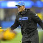Dec 19, 2024; Inglewood, California, USA; Los Angeles Chargers head coach Jim Harbaugh congratulates players after a score in the second half against the Denver Broncos at SoFi Stadium.