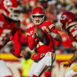 Dec 21, 2024; Kansas City, Missouri, USA; Kansas City Chiefs quarterback Patrick Mahomes (15) drops back to pass during the first half against the Houston Texans at GEHA Field at Arrowhead Stadium. Mandatory Credit: Jay Biggerstaff-Imagn Images