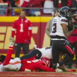 Dec 21, 2024; Kansas City, Missouri, USA; Houston Texans wide receiver Tank Dell (3) catches a touchdown pass against Kansas City Chiefs cornerback Trent McDuffie (22) during the second half at GEHA Field at Arrowhead Stadium. Mandatory Credit: Jay Biggerstaff-Imagn Images