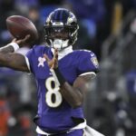 Dec 21, 2024; Baltimore, Maryland, USA; Baltimore Ravens quarterback Lamar Jackson (8) throws during the first half against the Pittsburgh Steelers at M&T Bank Stadium.