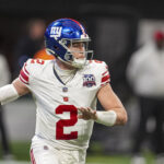 Dec 22, 2024; Atlanta, Georgia, USA; New York Giants quarterback Drew Lock (2) passes against the Atlanta Falcons during the first quarter at Mercedes-Benz Stadium. Mandatory Credit: Dale Zanine-Imagn Images