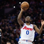 Dec 23, 2024; Philadelphia, Pennsylvania, USA; Philadelphia 76ers guard Tyrese Maxey (0) shoots the ball against the San Antonio Spurs during the second quarter at Wells Fargo Center.