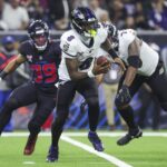 Dec 15, 2024; Houston, Texas, USA; Baltimore Ravens quarterback Lamar Jackson (8) runs with the ball during the second quarter against the Houston Texans at NRG Stadium. Mandatory Credit: Troy Taormina-Imagn Images