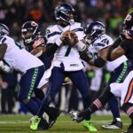 Dec 26, 2024; Chicago, Illinois, USA; Seattle Seahawks quarterback Geno Smith (7) looks to pass against the Seattle Seahawks during the third quarter at Soldier Field. Mandatory Credit: Daniel Bartel-Imagn Images