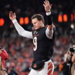 Cincinnati Bengals' quarterback Joe Burrow celebrates after his team's overtime win Dec. 28 at Paycor Stadium. The Bengals defeated the Broncos, 30-24, when Burrow found receiver Tee Higgins in the end zone to end the contest.
