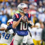 Dec 28, 2024; Foxborough, Massachusetts, USA; New England Patriots quarterback Drake Maye (10) looks to pass the ball against the Los Angeles Chargers in the first half at Gillette Stadium.