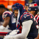Dec 28, 2024; Foxborough, Massachusetts, USA; New England Patriots linebacker Anfernee Jennings (33) on the sideline as they take on the Los Angeles Chargers in the second half at Gillette Stadium. Mandatory Credit: David Butler II-Imagn Images