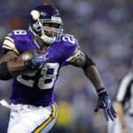 Nov 29, 2009; Minneapolis, MN, USA; Minnesota Vikings Adrian Peterson (28) rushes against the Chicago Bears in the third quarter at the Metrodome. Mandatory credit: Bruce Kluckhohn USA TODAY Sports - MVPs NFL