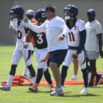 CENTENNIAL, COLORADO - JULY 31: Passing game coordinator John Morton works with players during the Denver Broncos training camp at Centura Health Training Center on July 31, 2023 in Centennial, Colorado. (Photo by RJ Sangosti/MediaNews Group/The Denver Post via Getty Images)