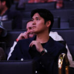 LOS ANGELES, CALIFORNIA - DECEMBER 08: Shohei Ohtani of the Los Angeles Dodgers attends the game between the Los Angeles Lakers and the Portland Trail Blazers at Crypto.com Arena on December 08, 2024 in Los Angeles, California. NOTE TO USER: User expressly acknowledges and agrees that, by downloading and or using this Photograph, user is consenting to the terms and conditions of the Getty Images License Agreement. (Photo by Meg Oliphant/Getty Images)