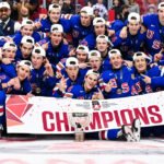 OTTAWA, CANADA - JANUARY 05: Team USA pose with the IIHF Cup after winning gold in overtime against Team Finland during the 2025 IIHF World Junior Championship at Canadian Tire Centre on January 5, 2025 in Ottawa, Ontario, Canada. (Photo by Minas Panagiotakis/Getty Images)