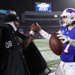 ORCHARD PARK, NEW YORK - JANUARY 19: Lamar Jackson #8 of the Baltimore Ravens and Josh Allen #17 of the Buffalo Bills embrace after the AFC Divisional Playoff game at Highmark Stadium on January 19, 2025 in Orchard Park, New York. (Photo by Al Bello/Getty Images)