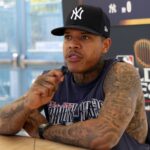 New York Yankees pitcher Marcus Stroman (0) speaks to media during workout day at Dodgers Stadium.