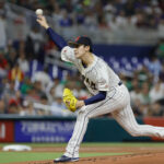 Baseball: World Baseball Classic - Semifinal Japan vs Mexico. Mar 20, 2023; Miami, Florida, USA; Japan starting pitcher Roki Sasaki (14) delivers a pitch during the first inning against Mexico at LoanDepot Park. Mandatory Credit: Sam Navarro-USA TODAY Sports