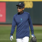 Apr 1, 2023; Seattle, Washington, USA; Seattle Mariners former outfielder Ichiro Suzuki walks to the dugout following batting practice against the Cleveland Guardians at T-Mobile Park. Mandatory Credit: Joe Nicholson-USA TODAY Sports