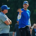 Indianapolis Colts head coach Shane Steichen speaks with General Manager Chris Ballard before the first day of training camp practice Wednesday, July 26, 2023, at Grand Park Sports Complex in Westfield, Indiana.